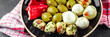 © Alesia Berlezova - antipasti food mix olives, mozzarella, stuffed pepper, mushroom antipasto fresh tasty eating appetizer meal snack on the table copy space food background