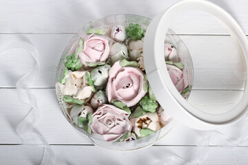 Wall Mural - Marshmallow flowers. Marshmallows in the box. Homemade marshmallows. A white hatbox. Top view.