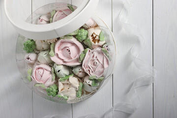 Wall Mural - Marshmallows in hatboxes. Marshmallow flowers. Homemade marshmallows. A white hatbox. Top view.