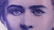 © Klochkov - Lesya Ukrainka's eyes closeup on a two hundred hryvnia bill. Ukrainian national currency banknote fragment. Portrait of Lesya Ukrainka on Ukrainian hryvnia