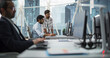 © Gorodenkoff - Two Indian Colleagues Having a Conversation While Busy Working on a Business Project. Software Engineer Talking with a Project Manager During a Meeting. Teamwork in a Modern Corporate Office