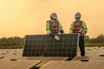 Photovoltaic engineers work on floating photovoltaics. workers Inspect and repair the solar panel equipment floating on water. Engineer working setup Floating solar panels Platform system on the lake.