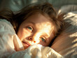 Cute and conceptual image of a Caucasian child with her head resting on a white pillow.