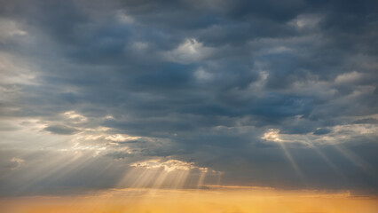 Wall Mural - after storm godrays with clouds as wonderful natural background