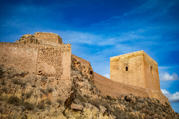 Sticker - View of the imposing Alfonsina tower of the medieval castle of Lorca, Region of Murcia, Eepaña, in daylight