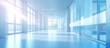 Medical blurred background in a light hospital hallway with a blue interior illustrating a clinical healthcare concept
