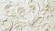 Closeup texture fragment shot of wall, decorated with decorative white plaster, putty with decorative lace and ornate patterns, irregularities and roughness