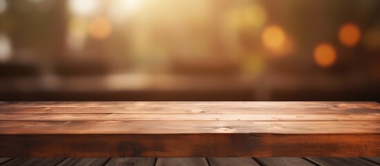 Sticker - Empty brown wooden table with blurred background ideal for photomontage or product display