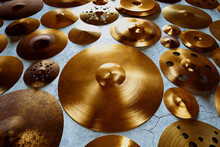 Assorted Cymbals On Textured Surface For Drummer's Performance