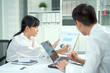 © DG PhotoStock - White collar workers in office.