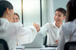 © DG PhotoStock - White collar workers in office.
