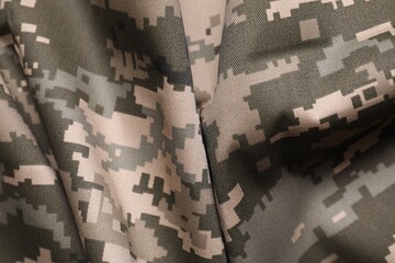 Poster - Texture of crumpled camouflage fabric as background, top view