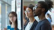 © Justlight - Two students stand in front of a poster presentation discussing their research findings with a group of diverse peers. This image showcases the academic exchange of knowledge