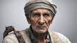 A wise old man wearing a traditional turban