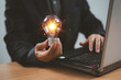 Idea knowledge, education solution concept. Innovative digital technology. Brainstorm creativity, idea thinking. Businessman use computer with light bulb icon. Inspiration for sustainable business