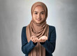 Happy Moslem Young South East Asia Woman:  Beautiful Southeast Asia woman with earth tone hijab smiling open hands