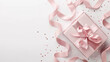 Top view photo of pink gift boxes with pink bow on isolated pastel pink background