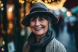 Portrait of smiling middle-aged woman in hat and scarf on Christmas market
