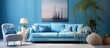 Comfortable sofa in a pleasant blue living room