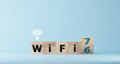 © Smile Studio AP - turns dice and changes the expression 'WiFi 6' to 'WiFi 7'.