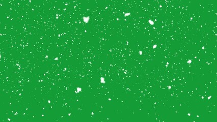 Wall Mural - Snow falling on green background