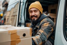 Delivery worker stacking cardboard boxes in a van during a busy workday