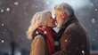 A snowy kiss for an older couple