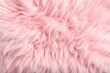 Light pink long fiber soft fur. Pastel background or texture. Fuzzy shaggy blanket. Fluffy fake textile. Flat lay, top view, copy space.
