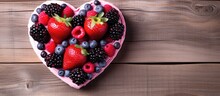 Vibrant Heart-Shaped Bowl Overflowing with Fresh, Juicy Berries - Delicious Healthy Snack Concept