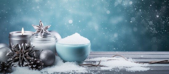 Poster - Cozy Winter Scene with Two Lit Candles and Snowflakes on Rustic Wooden Table