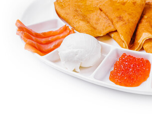 Wall Mural - pancakes with red caviar and salmon and ice cream