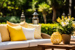 Cozy Outdoor Living Space with Decorative Pillows. An inviting outdoor seating area featuring a wooden sofa with white cushions and vibrant yellow throw pillows, complemented by lush greenery.
