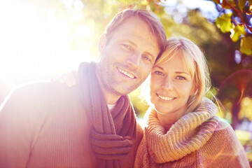 Sticker - Portrait, hug and sunshine with couple in a park, nature and love with marriage and happiness. Face, embrace or man with woman or lens flare with vacation for anniversary or summer with weekend break