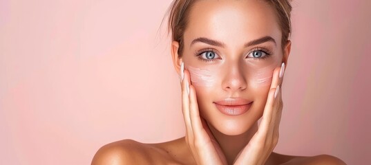 Wall Mural - Young woman with healthy skin, natural makeup, studio shot on pastel background with copy space