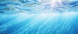Serene Underwater World: Blue Ocean with Sunlit Water Bubbles Dance in Peaceful Harmony