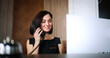 © ihorvsn - Portrait of attractive and friendly young female receptionist using computer at work to manage. Beautiful professional Caucasian woman working as manager of luxury hotel and taking calls.