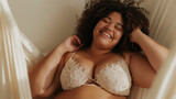 Fototapeta Kwiaty - Body Positive. Beautiful Curvy Woman Posing In Underwear Over Beige Studio Background,