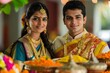 Indian young couple celebrate Ugadi festival in a Hindu setting and adorned in traditional attire