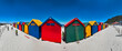 Panorama of the colourful beach huts on the beach of Muizenberg, Cape Town