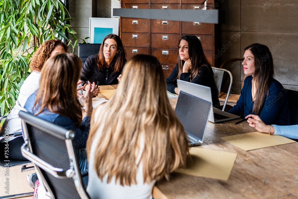 Women's team in corporate meeting at modern office Stock Photo | Adobe ...