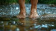 © Patrycja - Bare feet dipped in a refreshing and rejuvenating stream, cooled by clear, bubbling water and raindrops falling, seeking rest from a hiking adventure on a hot summer day