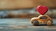 a wooden toy car and heart shape