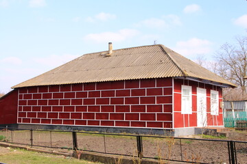 Wall Mural - A red barn with a fence