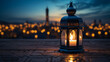 Lantern that have moon symbol on top and small plate of dates fruit with night sky and city bokeh light background for the Muslim feast of the holy month of Ramadan Kareem.