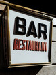 © VICTOR TORRES/Stocksy - Retro Bar Sign