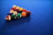 © Rowena Naylor/Stocksy - Balls set up for game on pool table