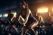 Fitness, sport, training and lifestyle concept - group of people exercising on stationary bike in gym at sunset
