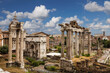 View of the Roman Forum with the temple of Saturn, the Temple of Vespasian and Titus, and the arch of Septimius Severus. Rome, Italy