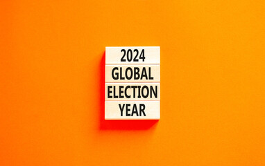 2024 global election year symbol. Concept words 2024 global election year on beautiful wooden block. Beautiful orange table orange background. Business 2024 global election year concept. Copy space.