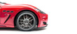 Lateral view of a generic and unbranded red sport car on a white background
